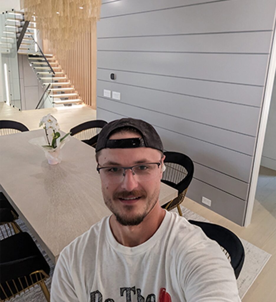 Home 1 Owner of Paint Lions smiling at completed interior painting project