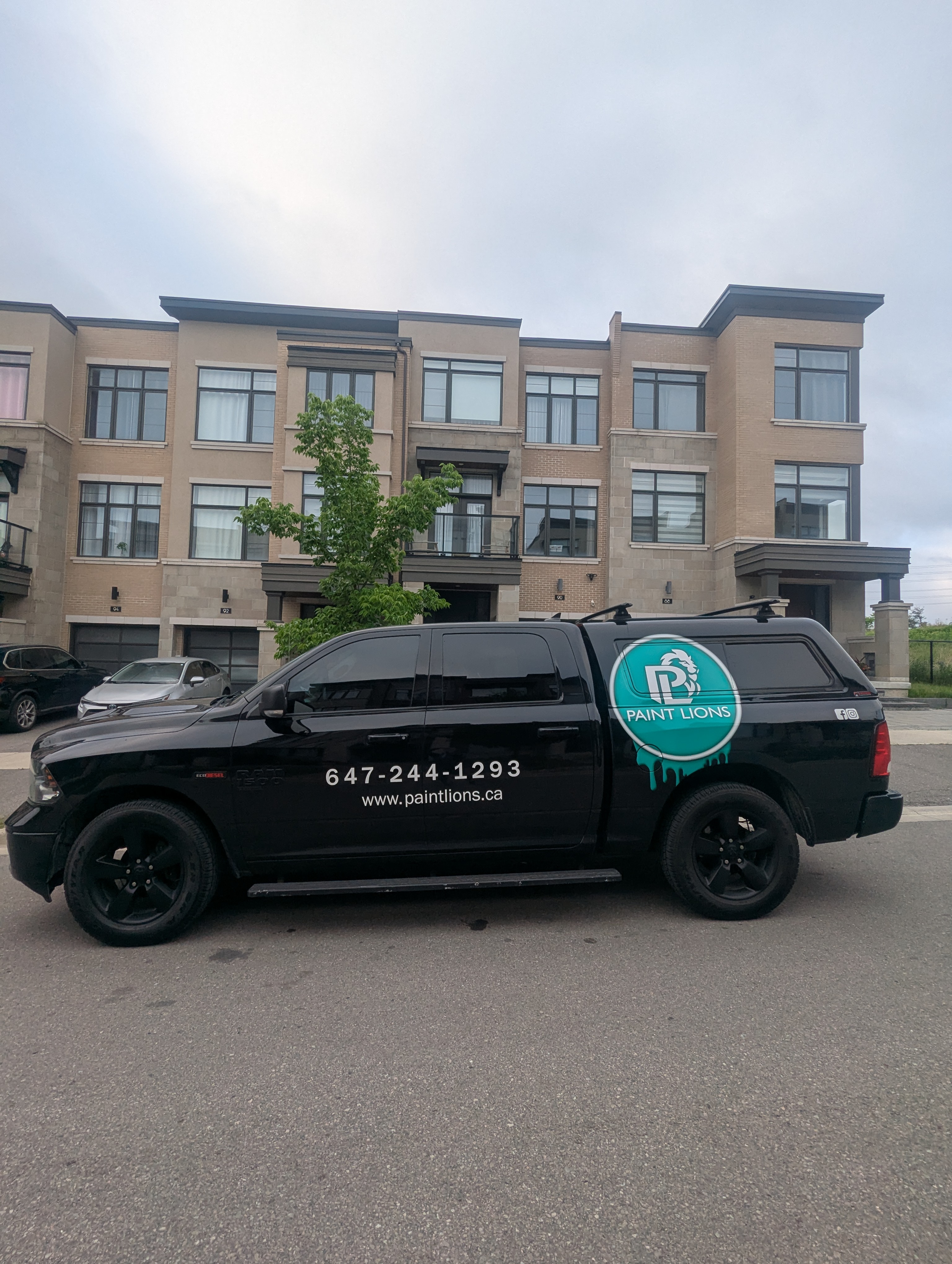 House Painters in Richmond Hill 1 Paint Lions Car in front of clients house in Richmond Hill