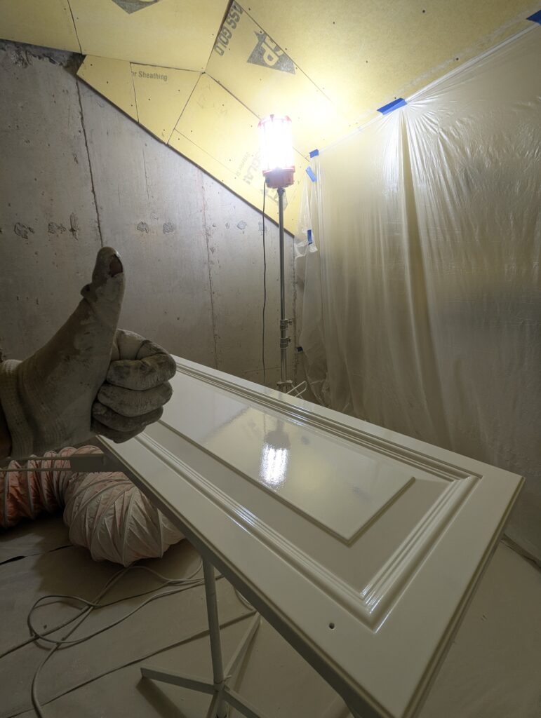 freshly sprayed kitchen cabinet door