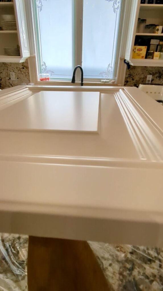 Freshly spray paint kitchen cabinet door